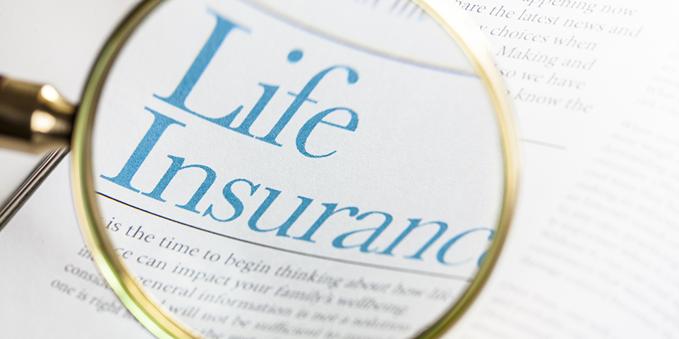 Life Insurance on magazine with magnifying glass. ++All text written by photographer++